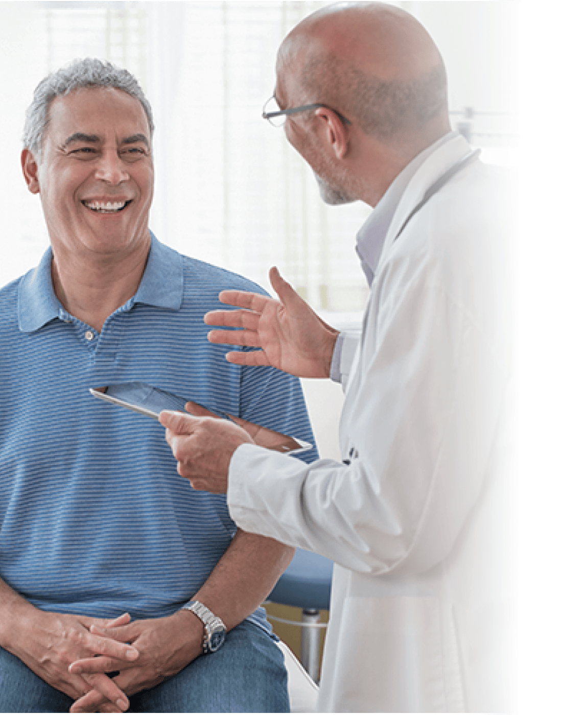 Doctor talking to male patient